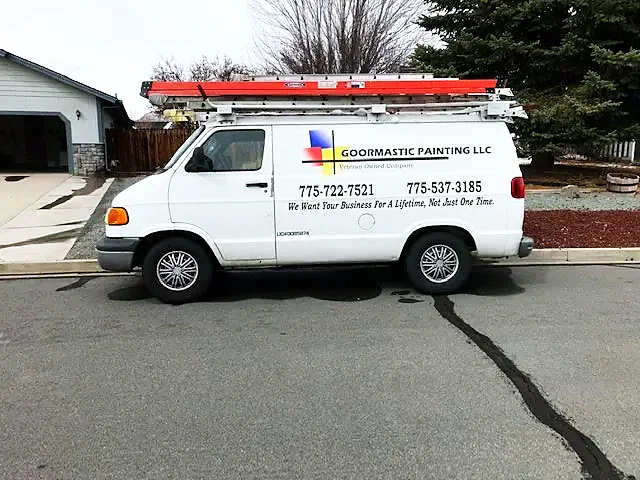 Goormastic Painting van parked outside a job