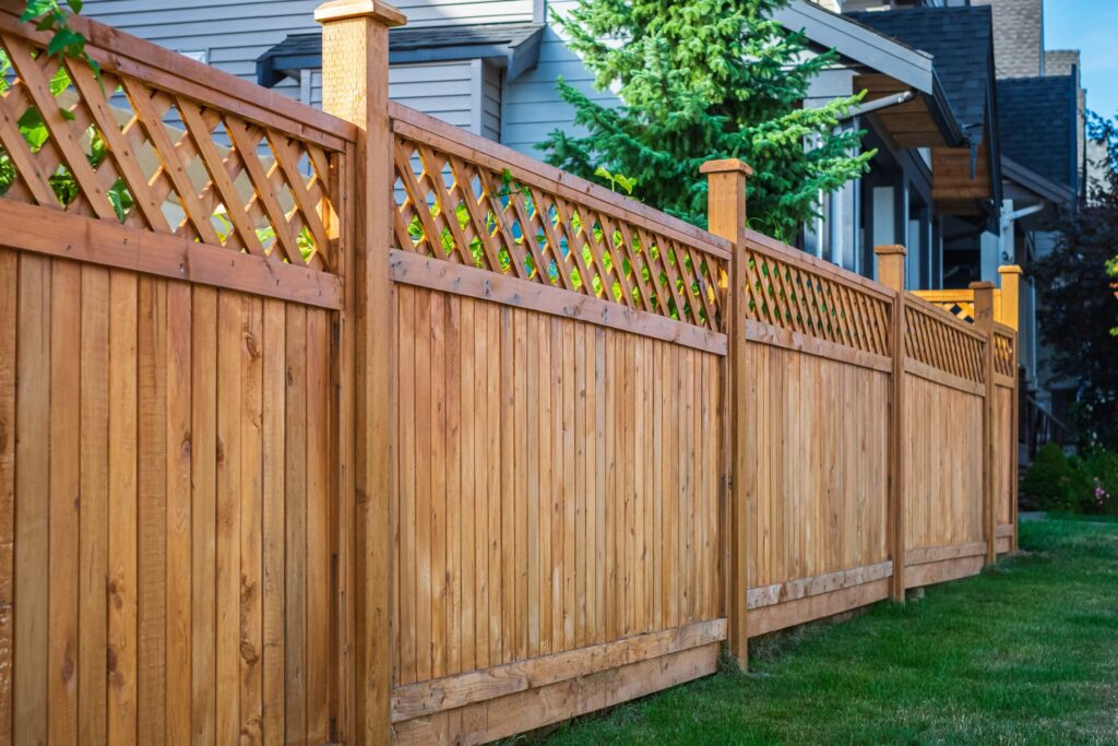 fence staining vs paint
